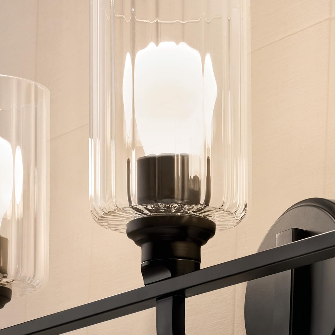 Kichler Gioe 24.25' 3-Light Bathroom Vanity Light Fixture with Clear Fluted Glass in Black, Modern Wall Mount Over Mirror for Powder Room, Damp Rated (24.25' W x 10.5' H), 55226BKFLU