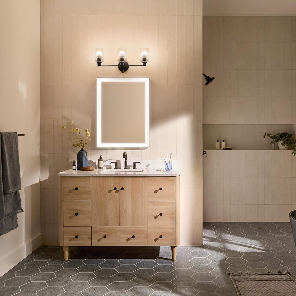 Kichler Gioe 24.25' 3-Light Bathroom Vanity Light Fixture with Clear Fluted Glass in Black, Modern Wall Mount Over Mirror for Powder Room, Damp Rated (24.25' W x 10.5' H), 55226BKFLU